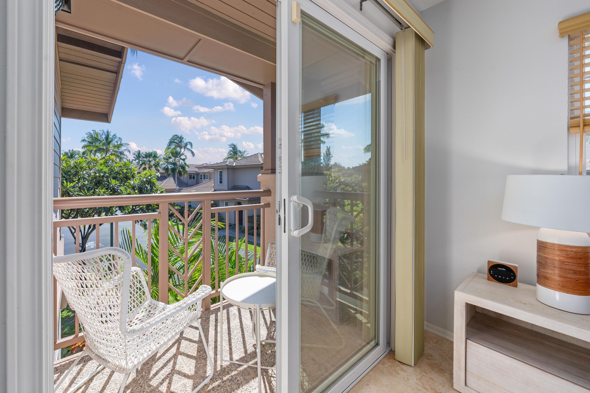 Step onto your private balcony and sink into the wicker chair, where tropical breezes and palm tree views create your perfect morning coffee spot.