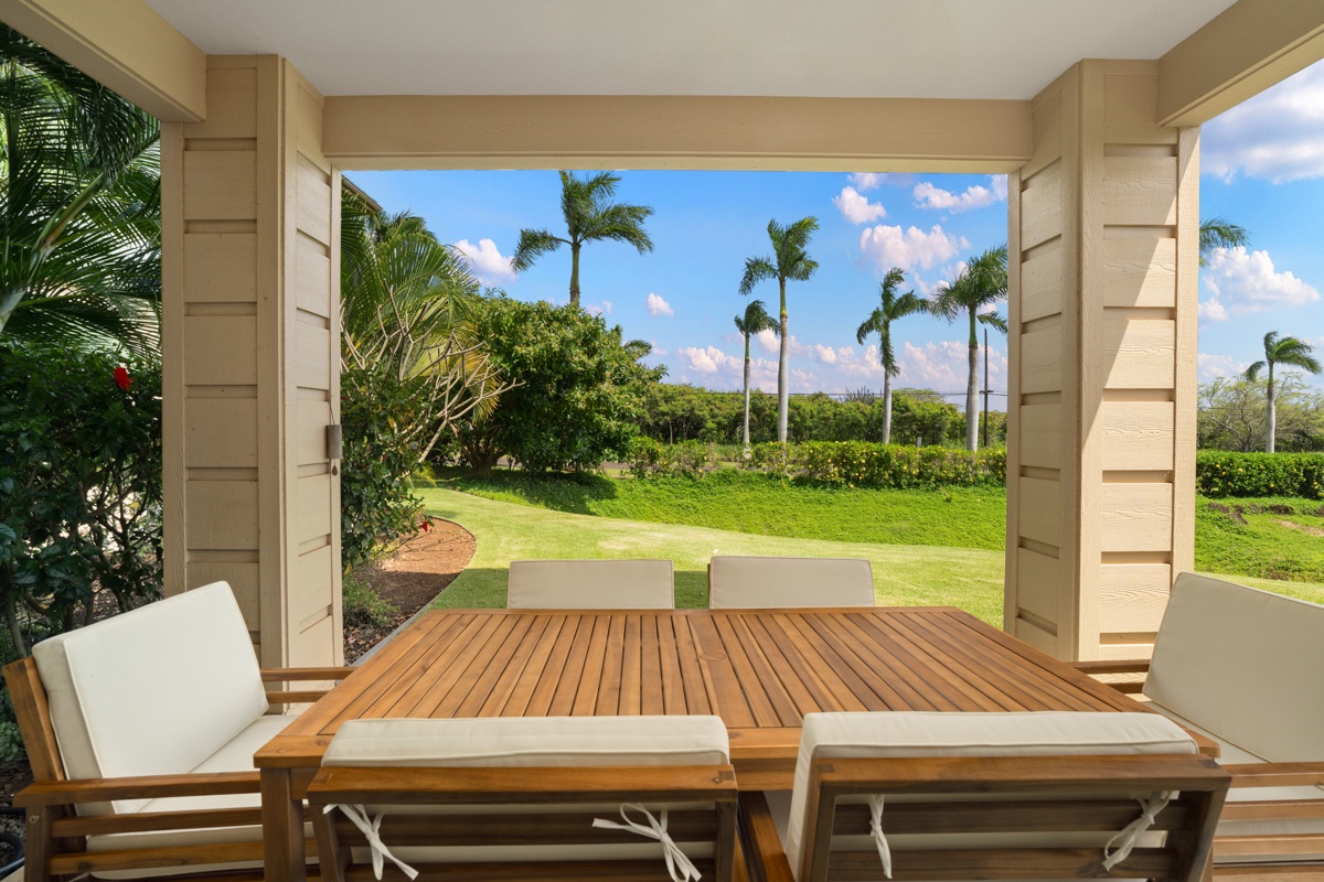Wake up to stunning garden views from your private terrace, where tropical palm trees frame endless green lawns.