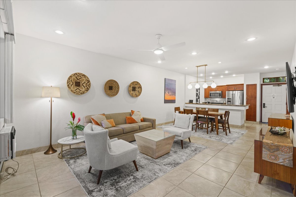 Elegant living space with global inspired decor and tropical charm