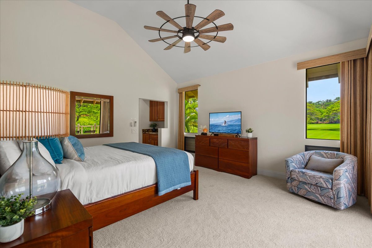 Wake up in your serene sanctuary with vaulted ceilings and lush garden views framing your peaceful retreat.