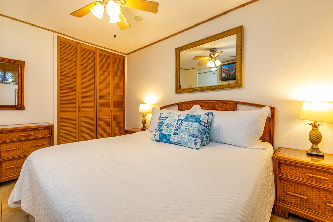 Sink into crisp white linens after a sun-filled day, with coastal-inspired touches and warm island ambiance inviting your restful escape.