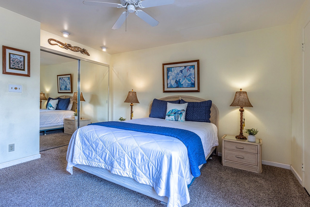 Slip into your coastal-inspired bedroom and unwind under the gentle breeze of the ceiling fan, with soothing ocean-blue accents welcoming you home.