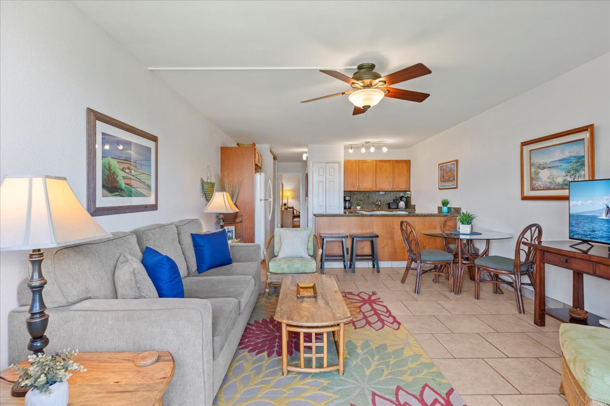 Settle into your open living space where comfort and convenience flow together. Your fully equipped kitchen awaits, and the ceiling fan keeps everything breezy.
