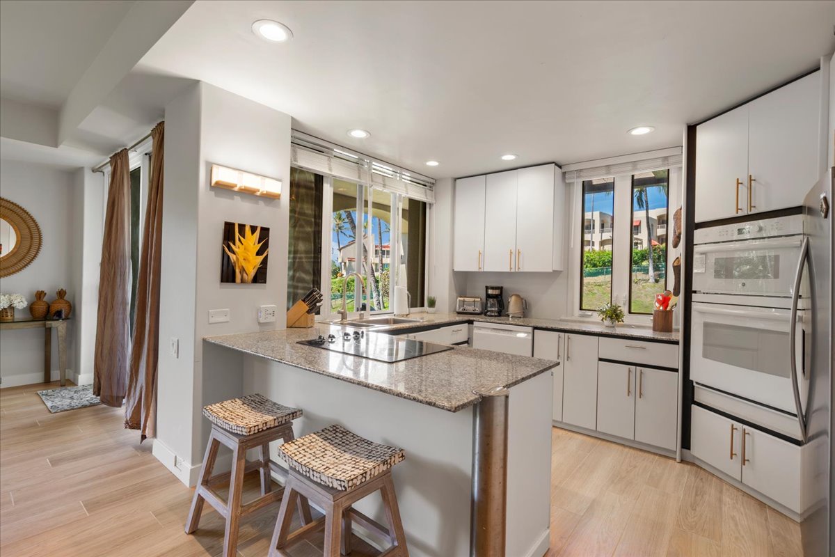 Bright kitchen with full size appliances and plenty of space