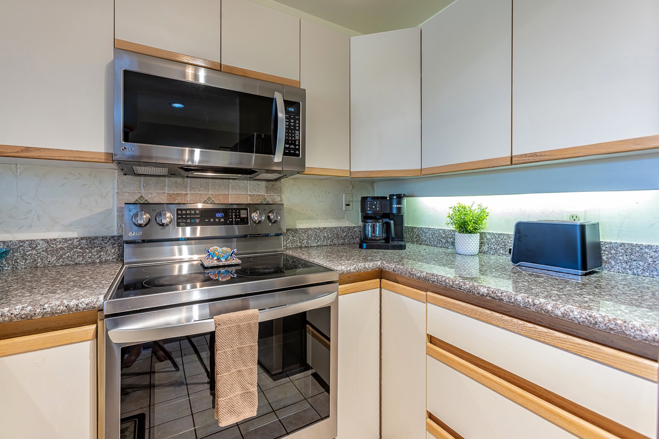 Step into your fully equipped kitchen, where modern appliances and sleek granite counters make meal prep a breeze. Fresh coffee in the morning, easy dinners at night—your home away from home starts here.