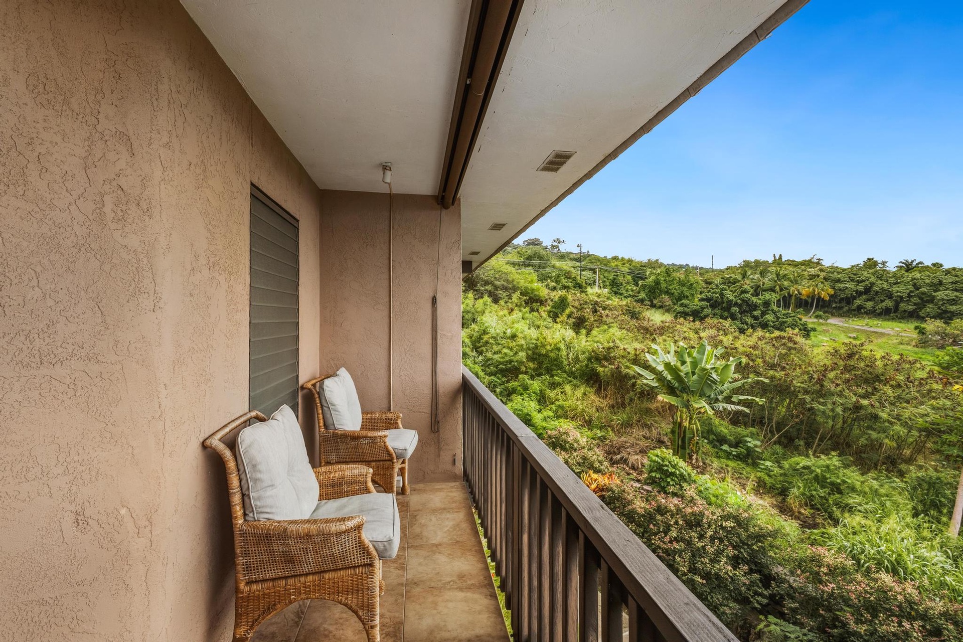 Morning coffee above the palms and pool