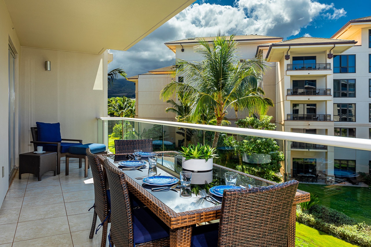 Gather around your private balcony for alfresco dining with lush garden views and bright tropical skies overhead—perfect for morning coffee or sunset meals.