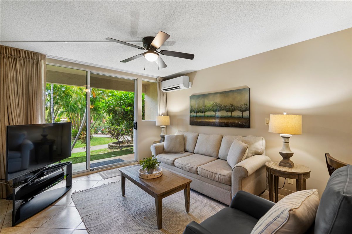 Cozy up in the living room next to garden scenery