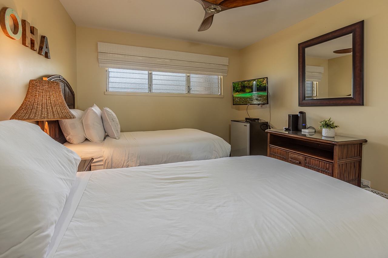 Watch TV from the comfort of the guest bedroom