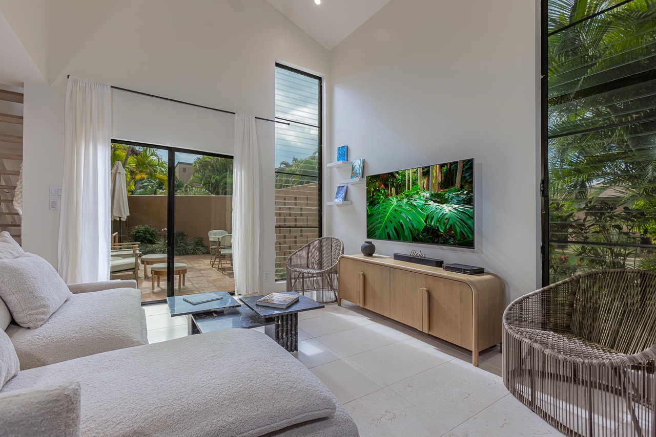 Indoor outdoor flow with doors opening to private lanais