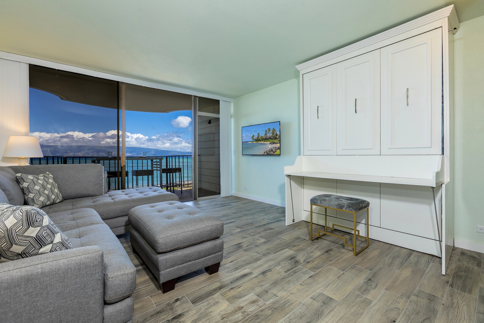 Step into your bright coastal retreat with breathtaking ocean views right from the living room. Your balcony opens to endless blue horizons, inviting you to unwind and soak in the tranquil seascape.