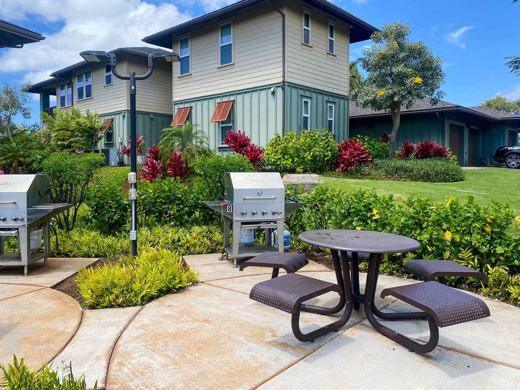 Fire up the grill and dine al fresco at your private outdoor table, surrounded by tropical landscaping and peaceful residential charm.