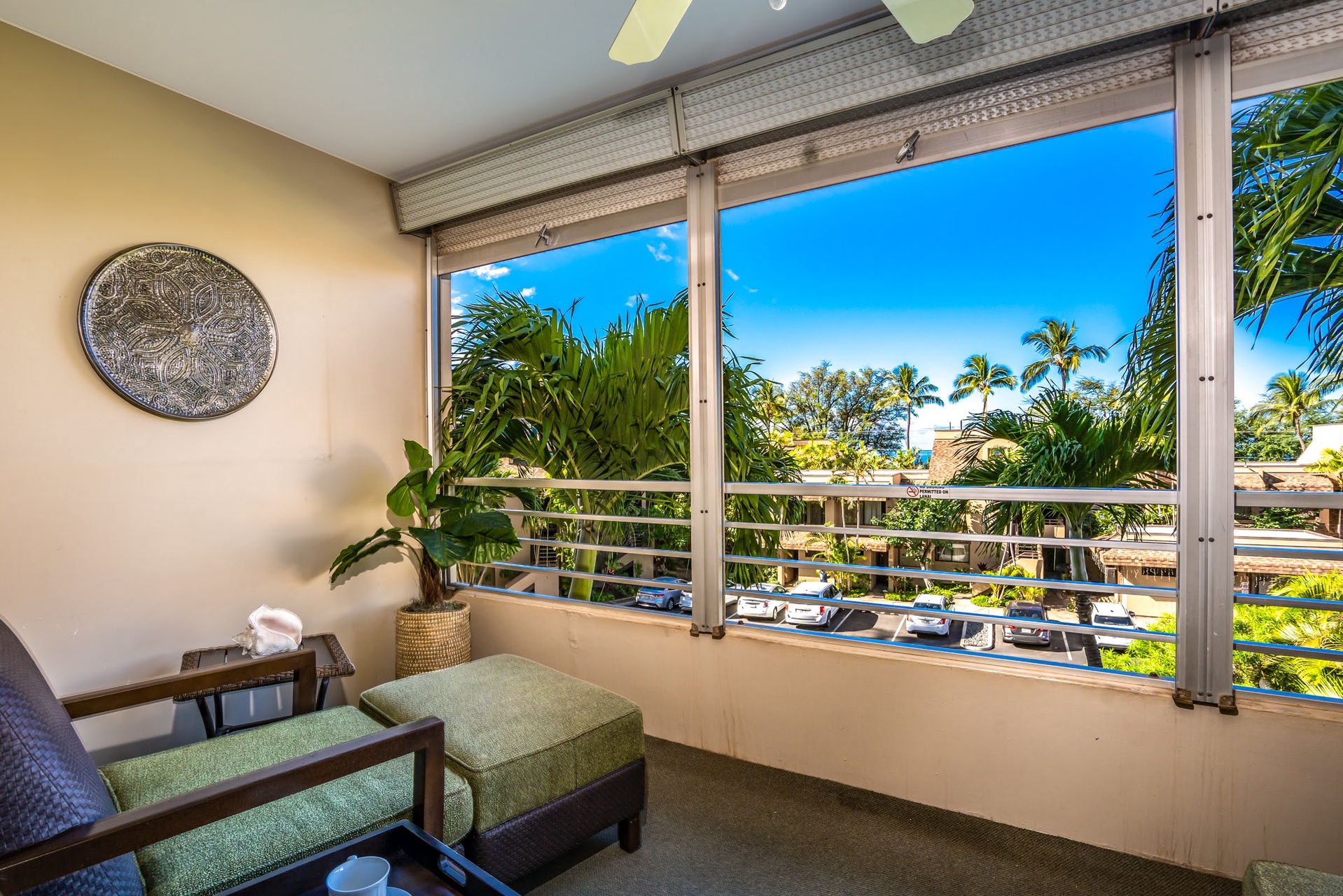 Step onto your private balcony and soak in tropical views framed by swaying palms and bright blue skies—perfect for morning coffee or sunset relaxation.
