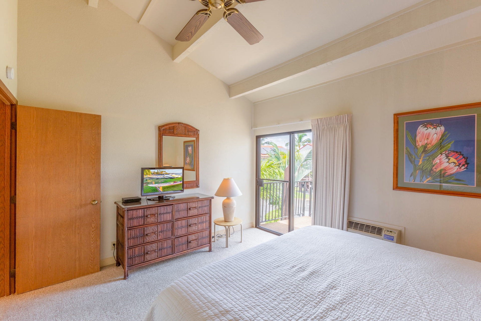 Bedroom to the left offers box AC and ceiling fan