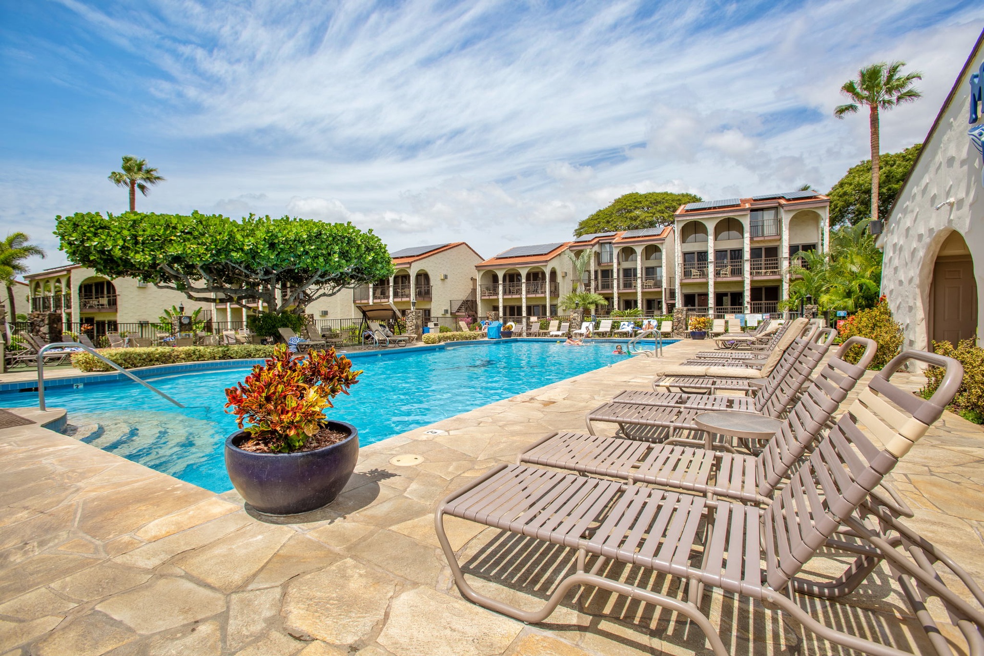 Sunbathe and relax at the huge main pool