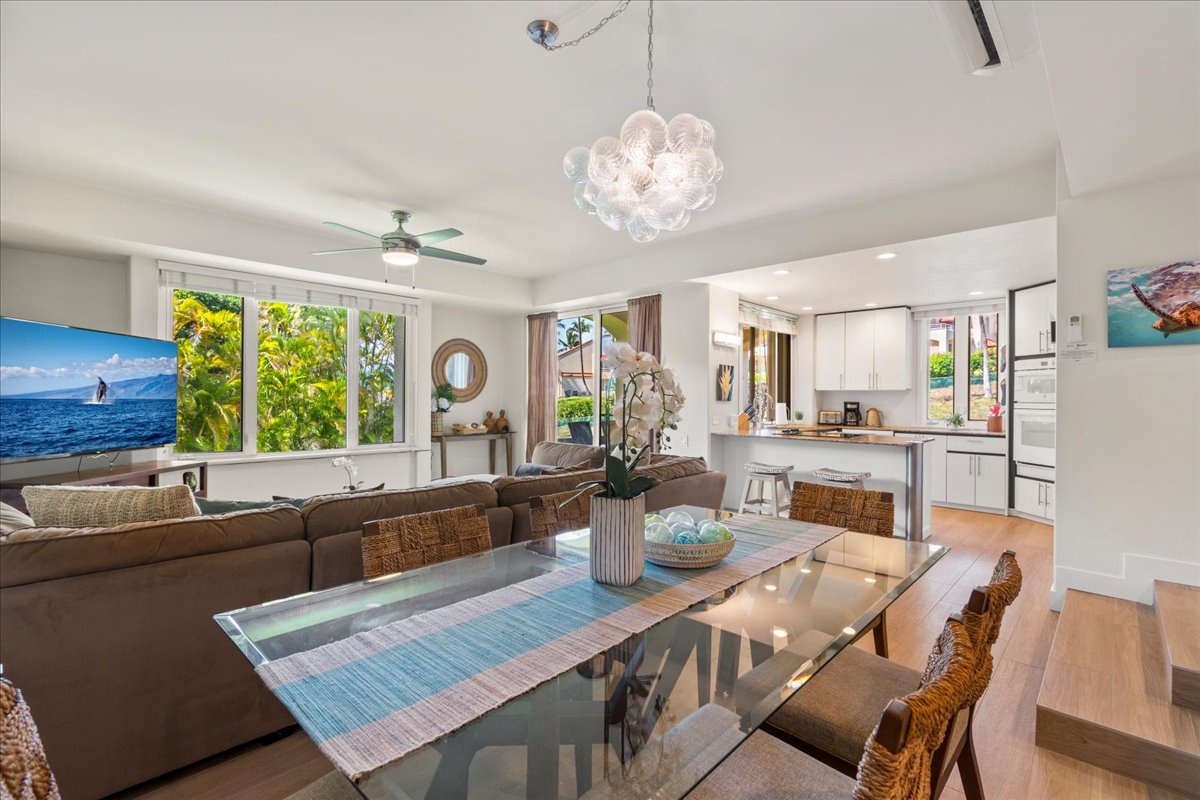 Gather around the spacious dining table with seating for six