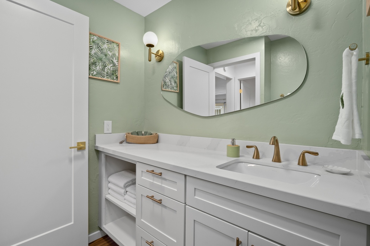 Spa like touches with plenty of vanity space.