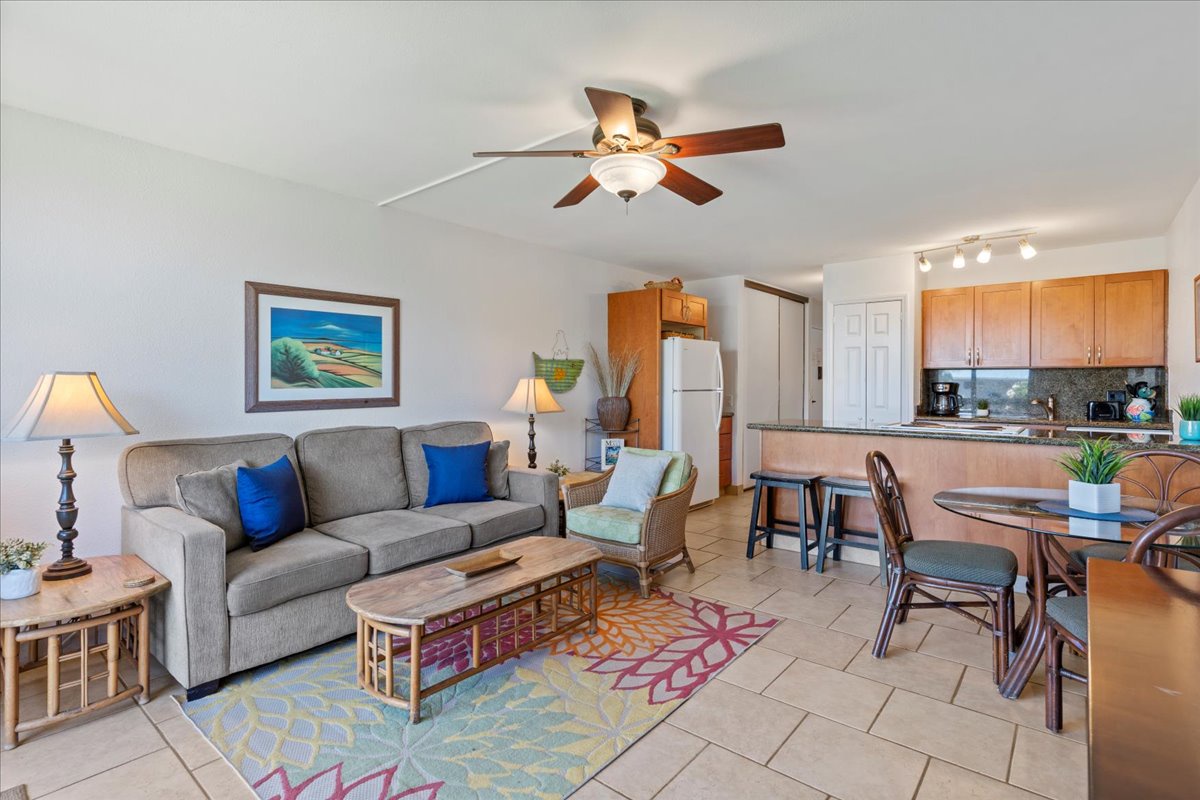 Relax in your bright, open living space with comfortable seating, a fully equipped kitchen, and coastal touches throughout. The ceiling fan keeps you cool while you unwind after your island adventures.