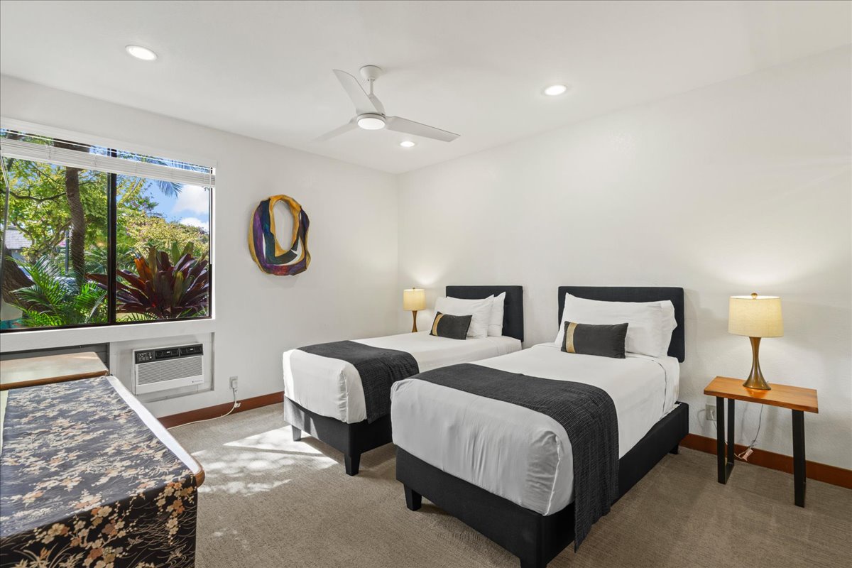Spacious guest bedroom with flexible king or two twin bed configuration