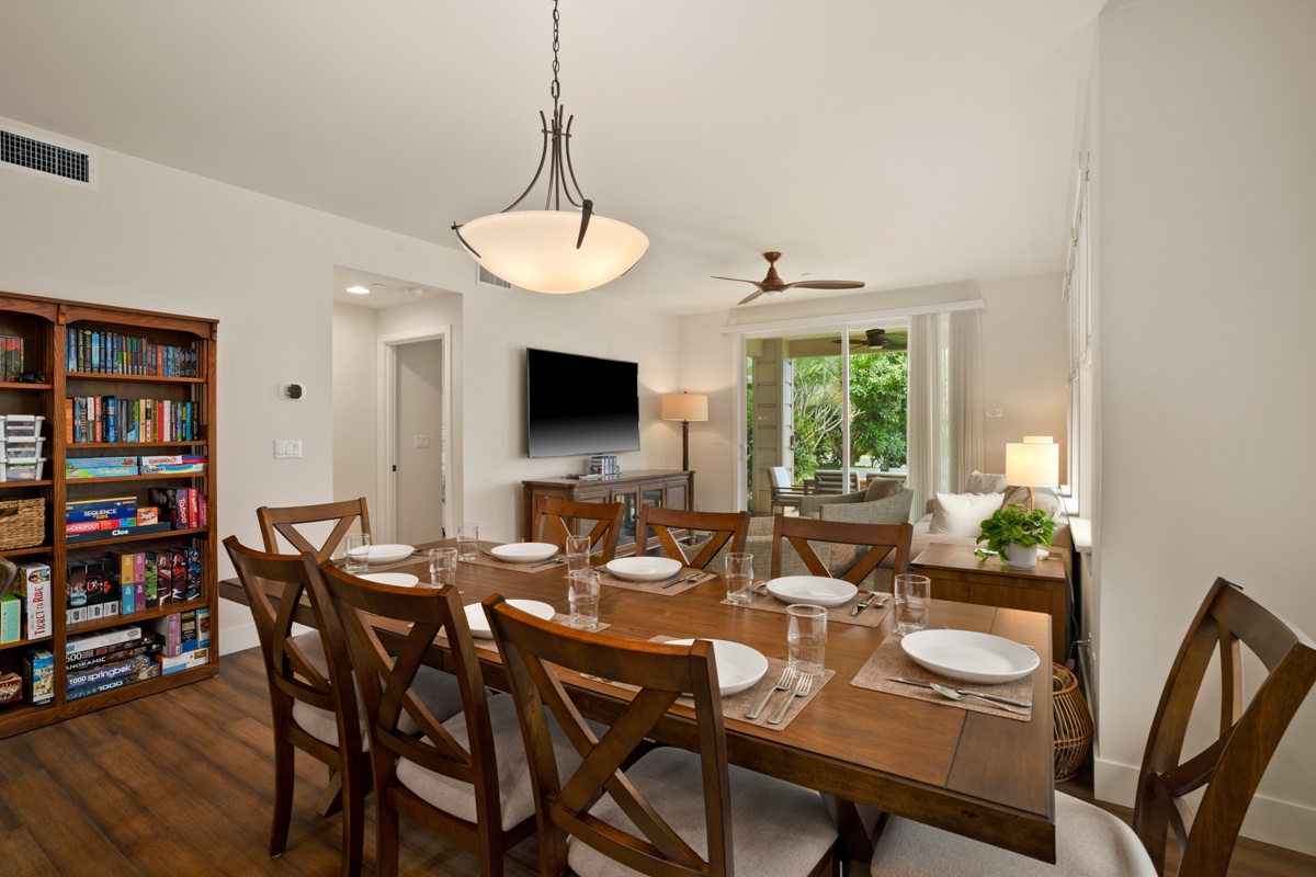 Gather around your elegant dining table for memorable meals with family and friends in this beautifully appointed space.