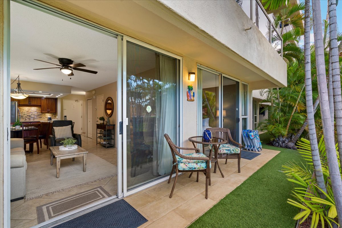 Slip onto the lanai and relax with a turf-lined garden