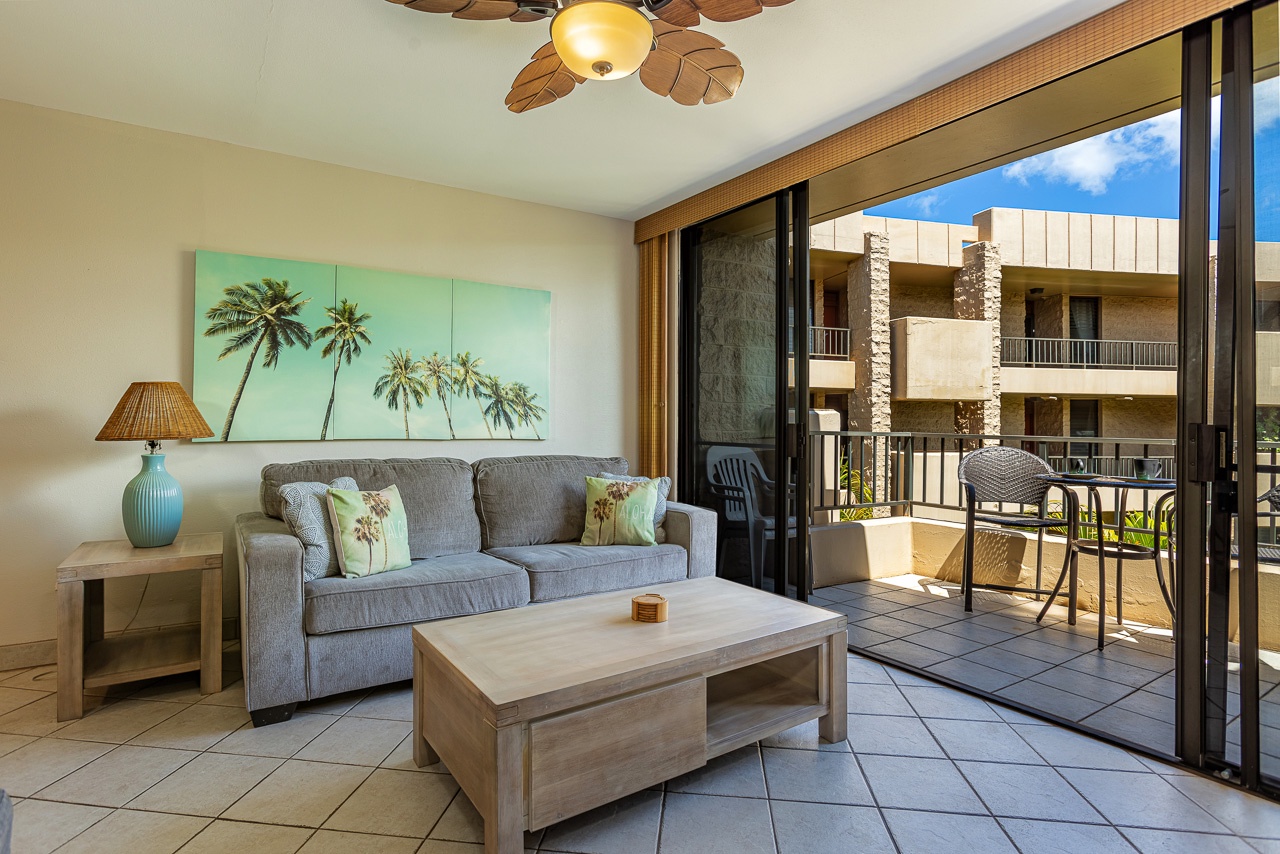 Relax in your bright, breezy living space opening onto a private balcony. Perfect for unwinding after beach adventures.