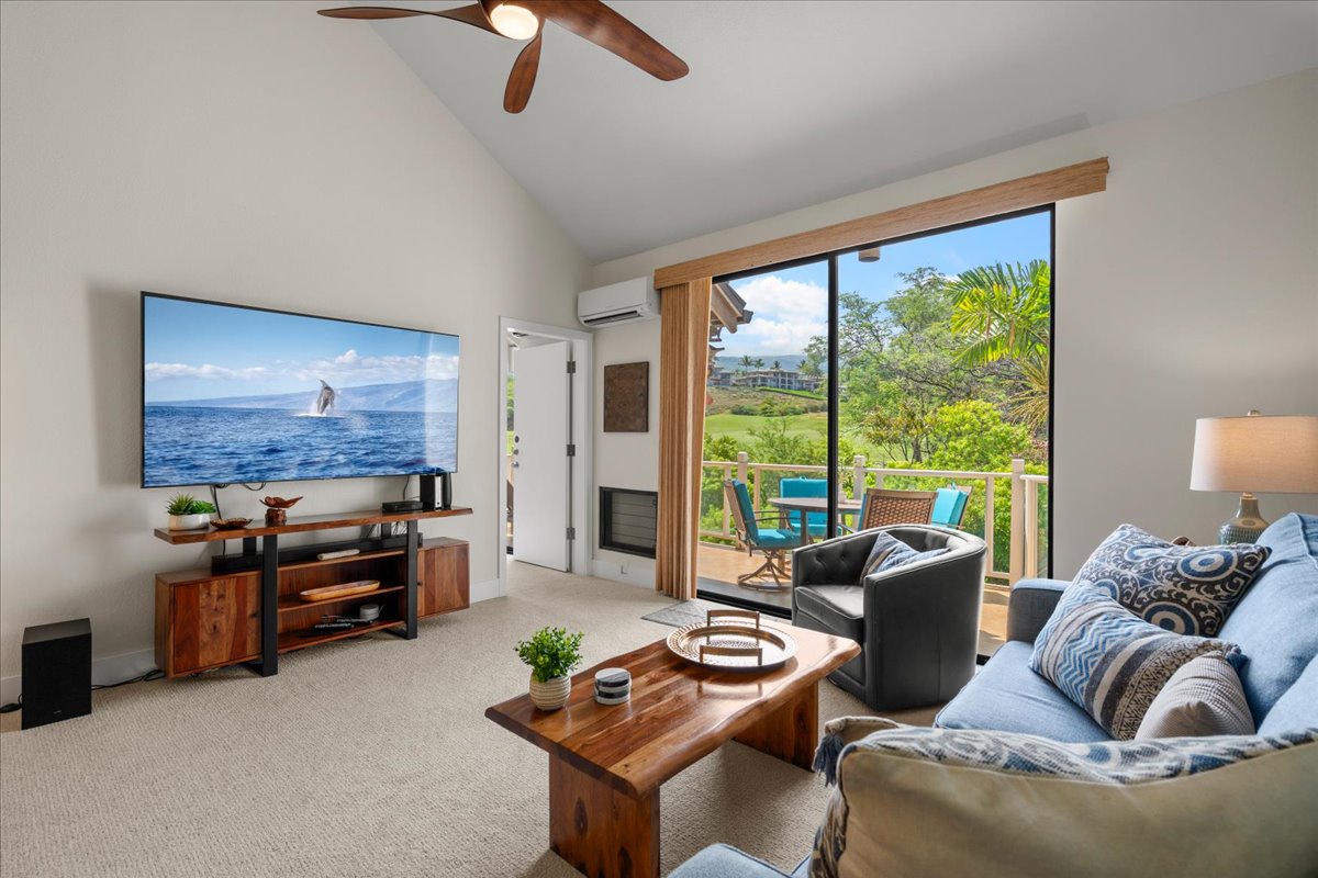 Settle into your bright, airy living room where comfort meets island style. Enjoy movies on the big screen, feel the breeze from your private balcony, and gaze at lush tropical views. Perfect for unwinding after a day of adventure.