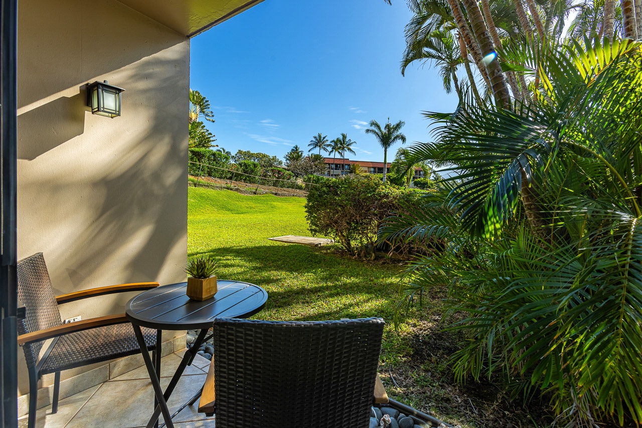 Relax on the lanai while the kids play on the grassy lawn