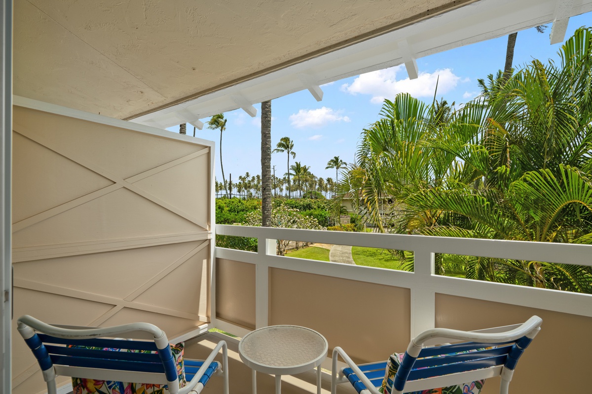Soak in sunshine and tropical breezes from your private lanai where swaying palms and lush gardens frame your peaceful retreat.
