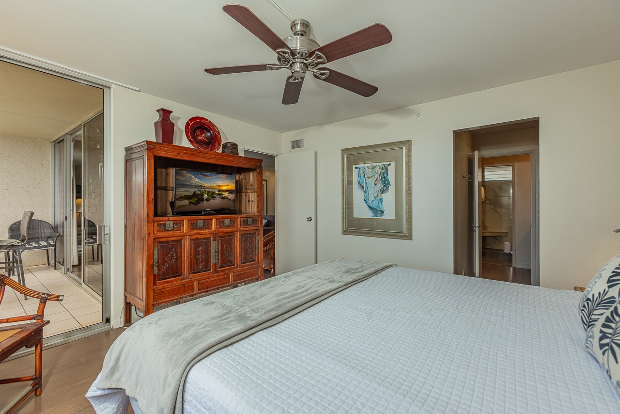 Relax in your spacious bedroom with entertainment center and private balcony