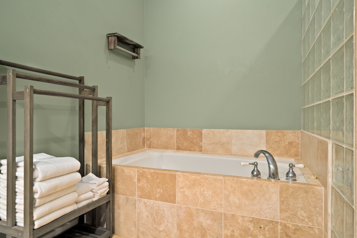 Slip into this beautifully tiled soaking tub after a day of exploring and let the warm water wash away your cares in this tranquil, spa-like setting.