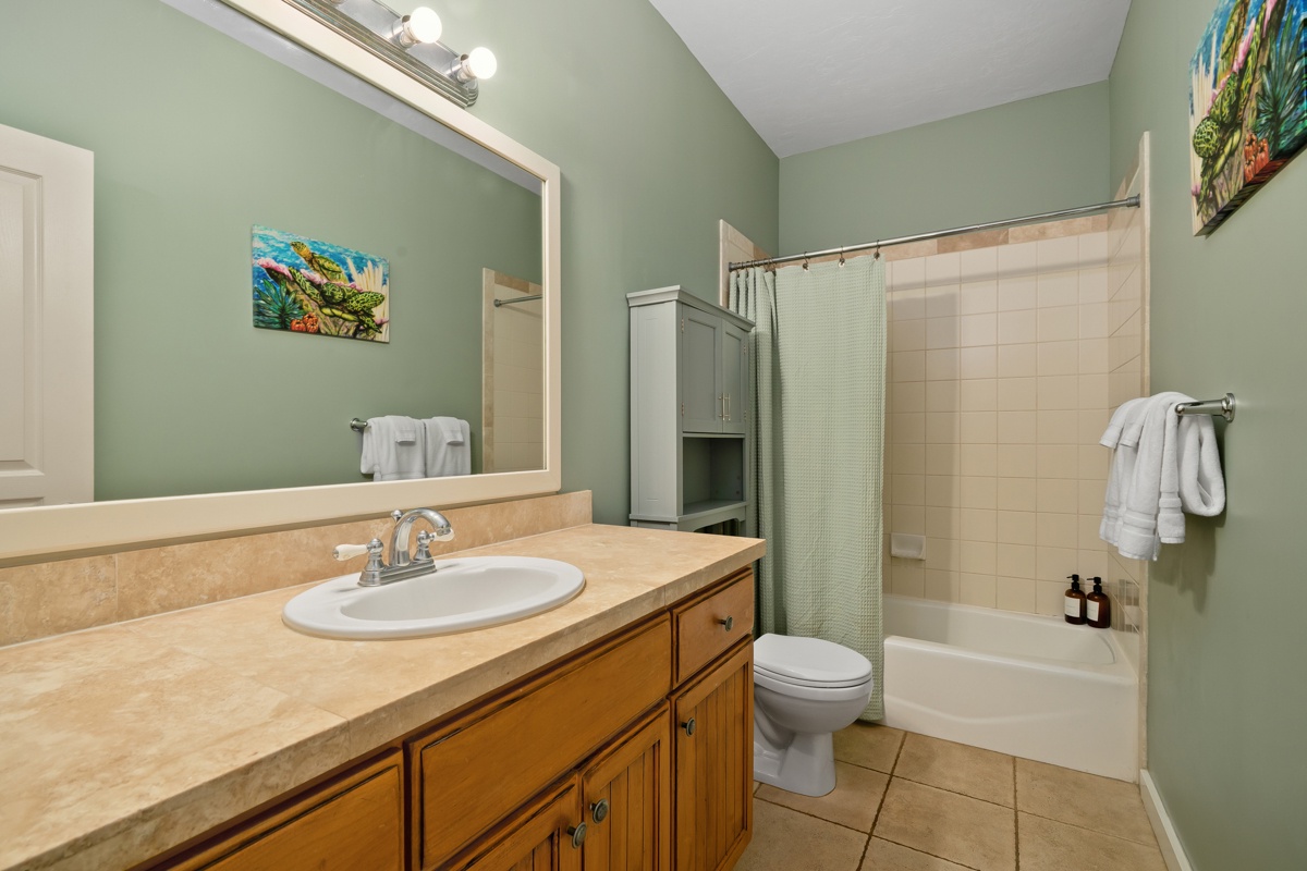Step into your private bathroom, a spacious vanity, and a relaxing tub-shower comb. Your perfect escape after a day of adventure.