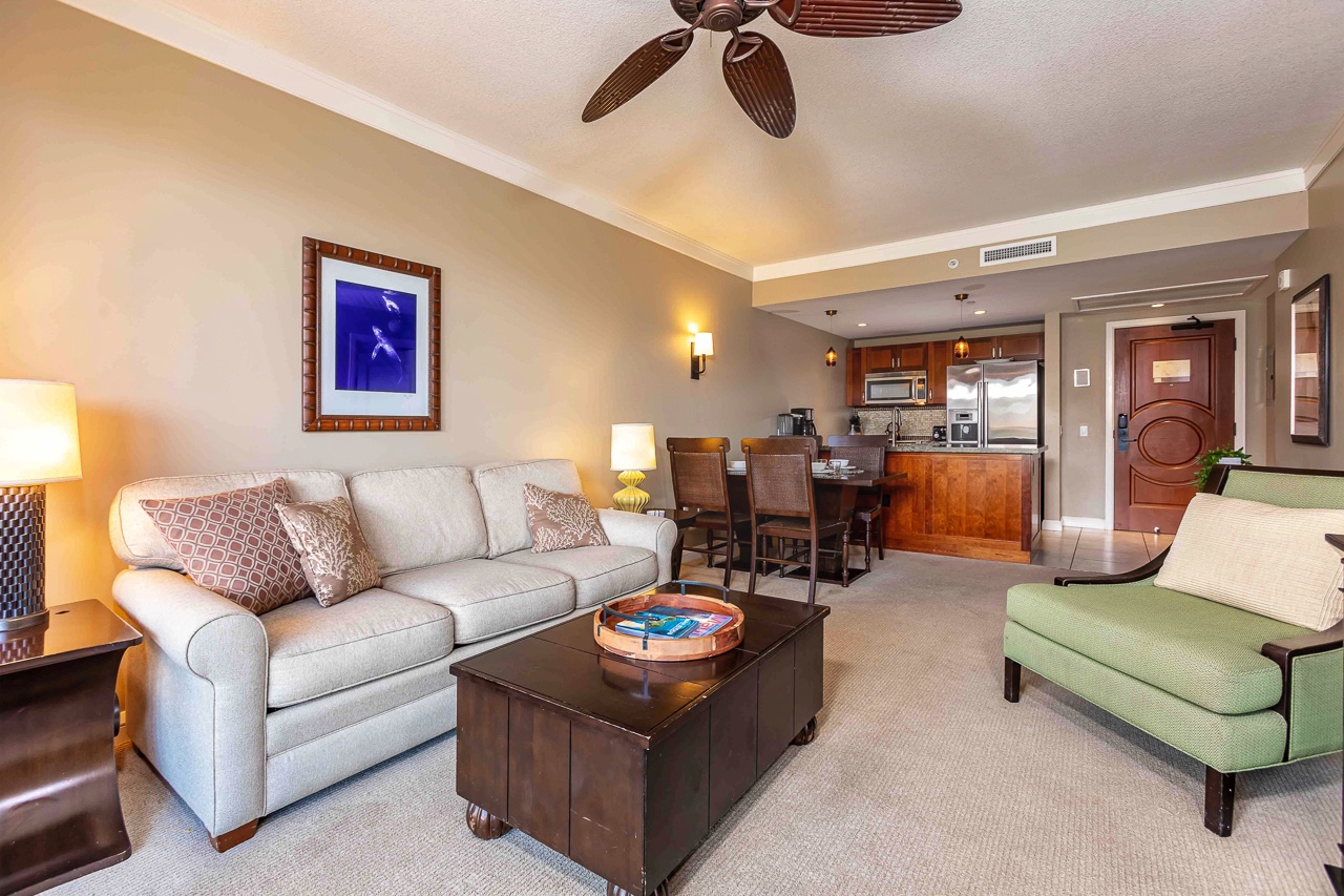 Unwind in this beautifully appointed living space with warm island decor, fully equipped kitchen, and plush sofa sleeper.
