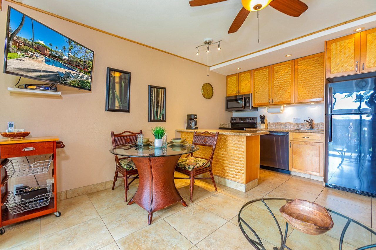 Relax in your island-inspired kitchen and dining area, where warm wood tones and tropical touches create the perfect space to enjoy your morning coffee or plan the day's adventures.