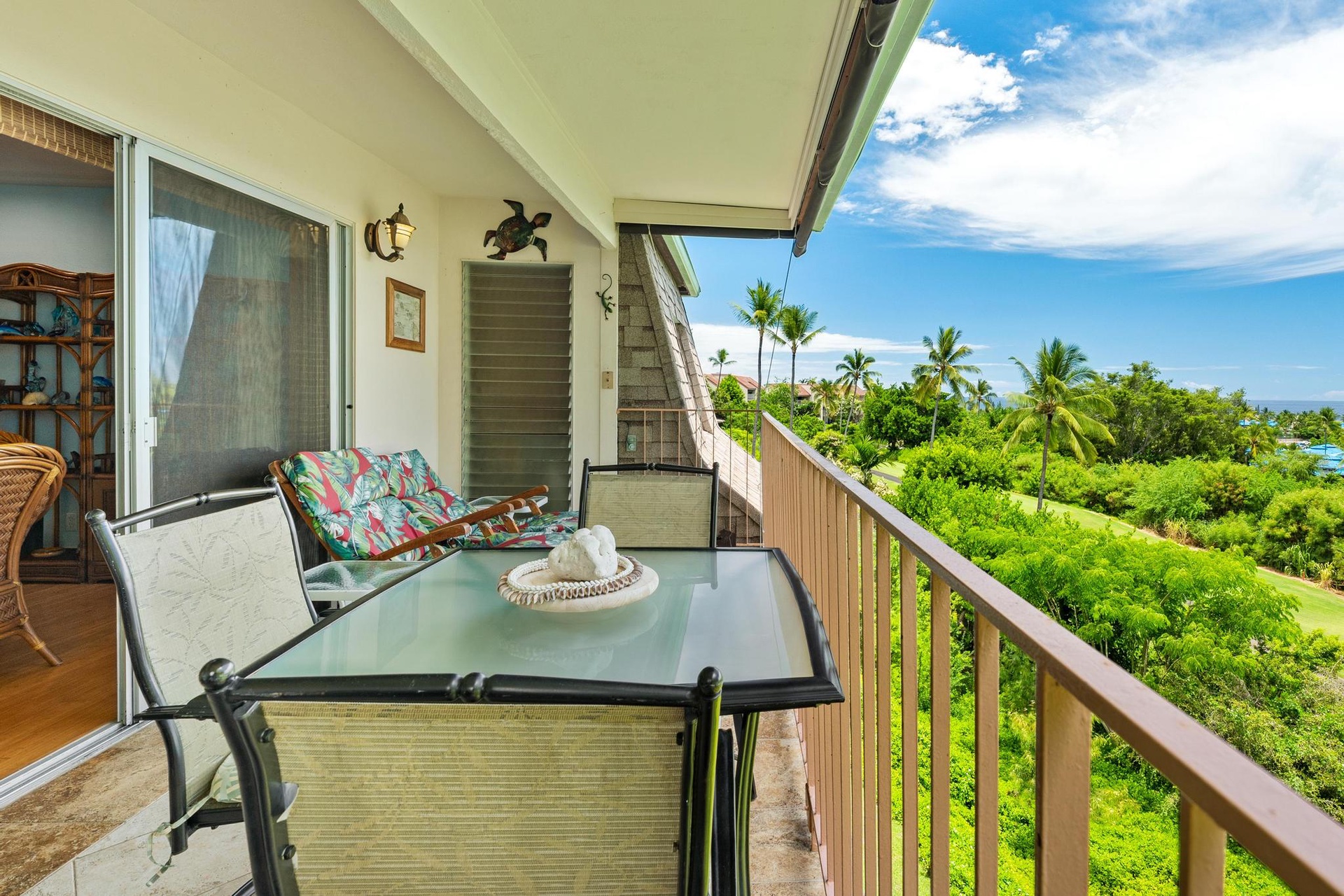 Unwind on your private balcony with tropical views, sipping morning coffee at your outdoor table surrounded by swaying palms.