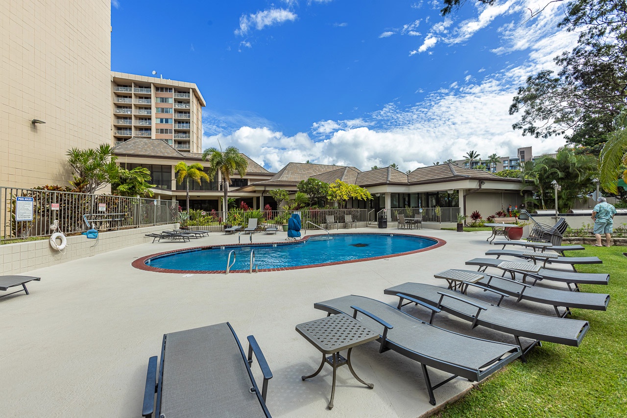 Sunlit pool area offering comfort and calm for every guest