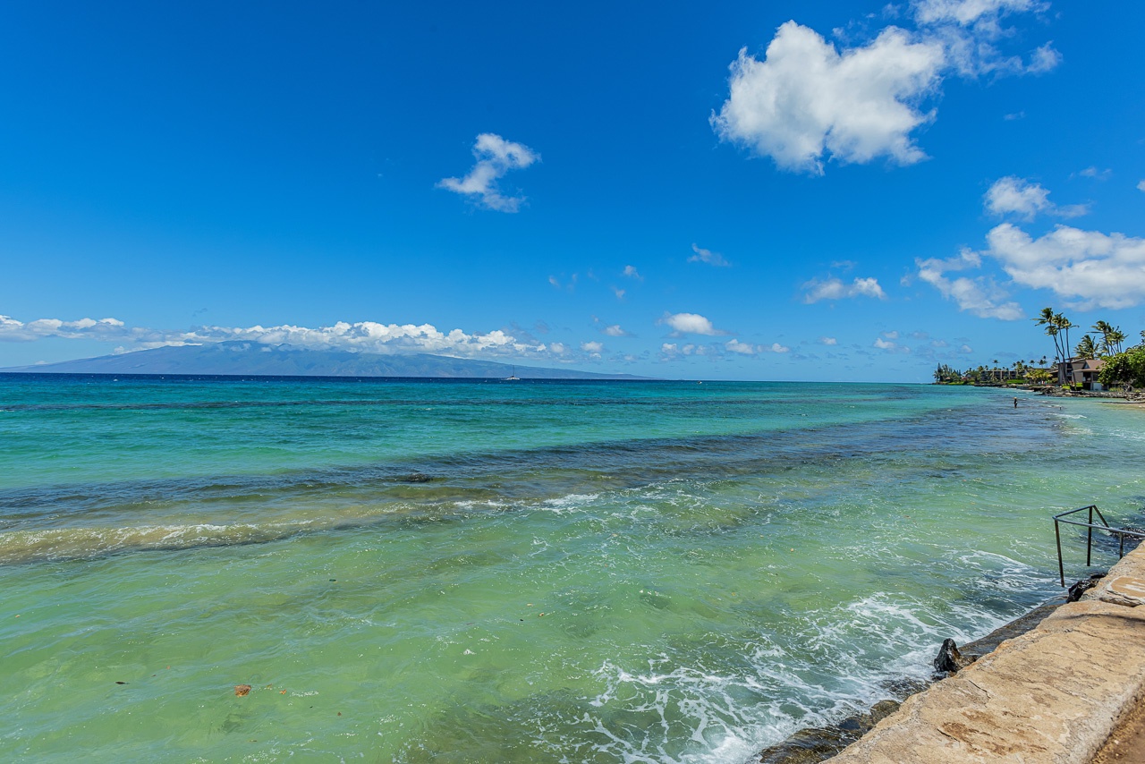 Crystal-clear turquoise waters meet soft sands along this stunning beachfront, where gentle waves and swaying palms set the scene for your ideal tropical escape.
