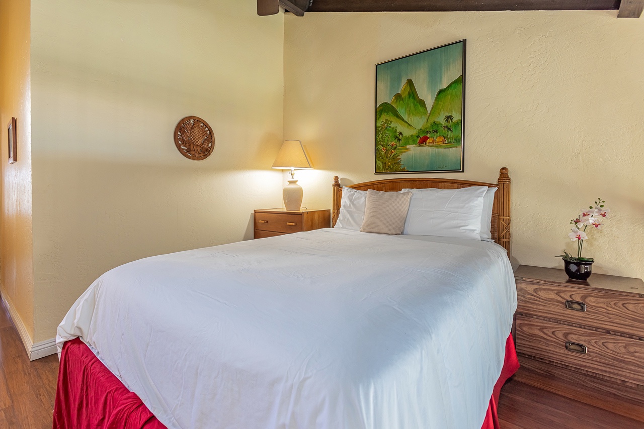 Queen bed loft offering a peaceful island escape