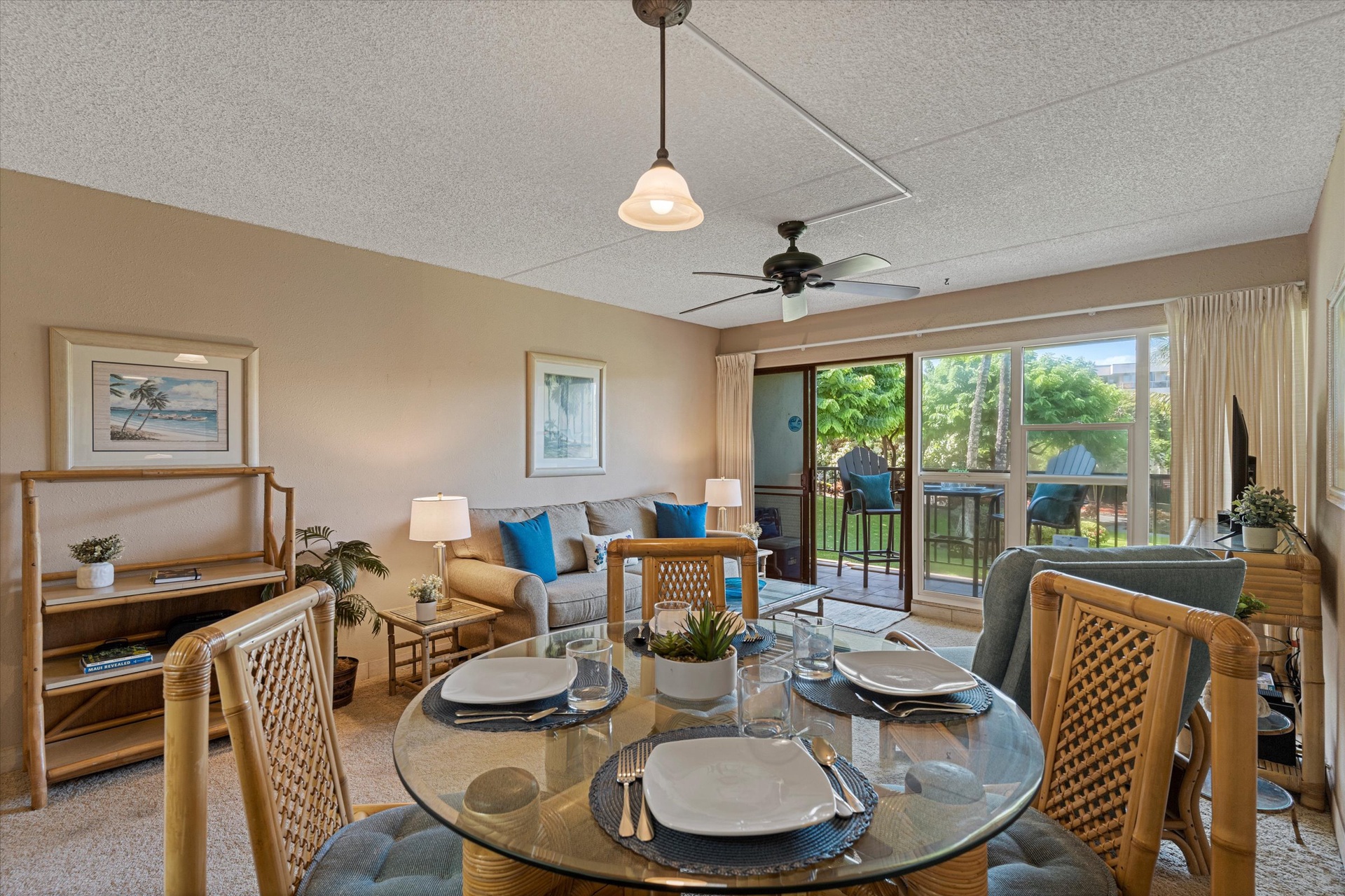 Relax in your open, sun-filled living space with a dining area for meals together and a cozy lounge, all opening to your private balcony overlooking tropical gardens.