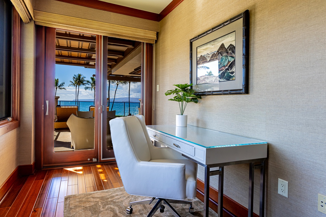 Settle into your private workspace with sweeping ocean views framed by swaying palms—the perfect spot to catch up on emails or simply daydream about the day ahead.