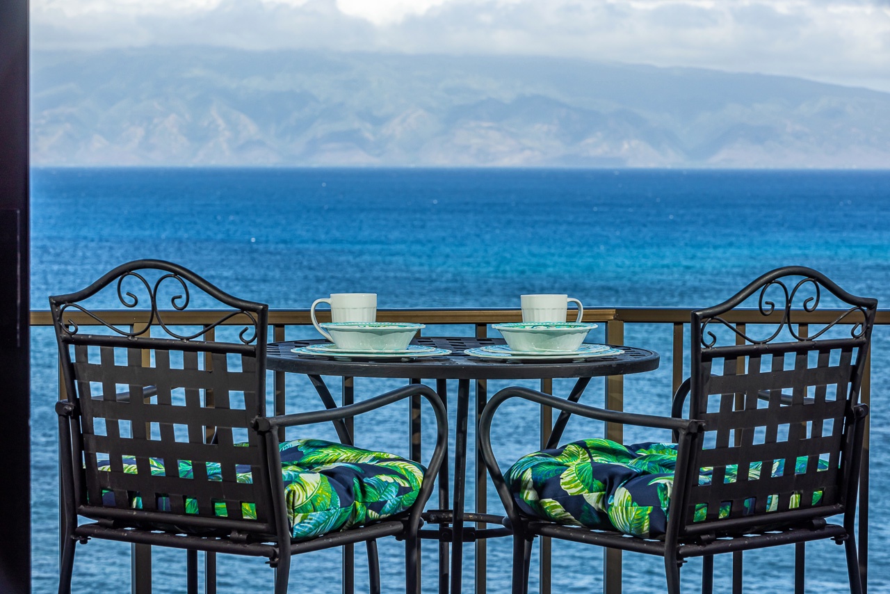 Picture yourself sipping morning coffee here, the endless turquoise ocean stretching before you.