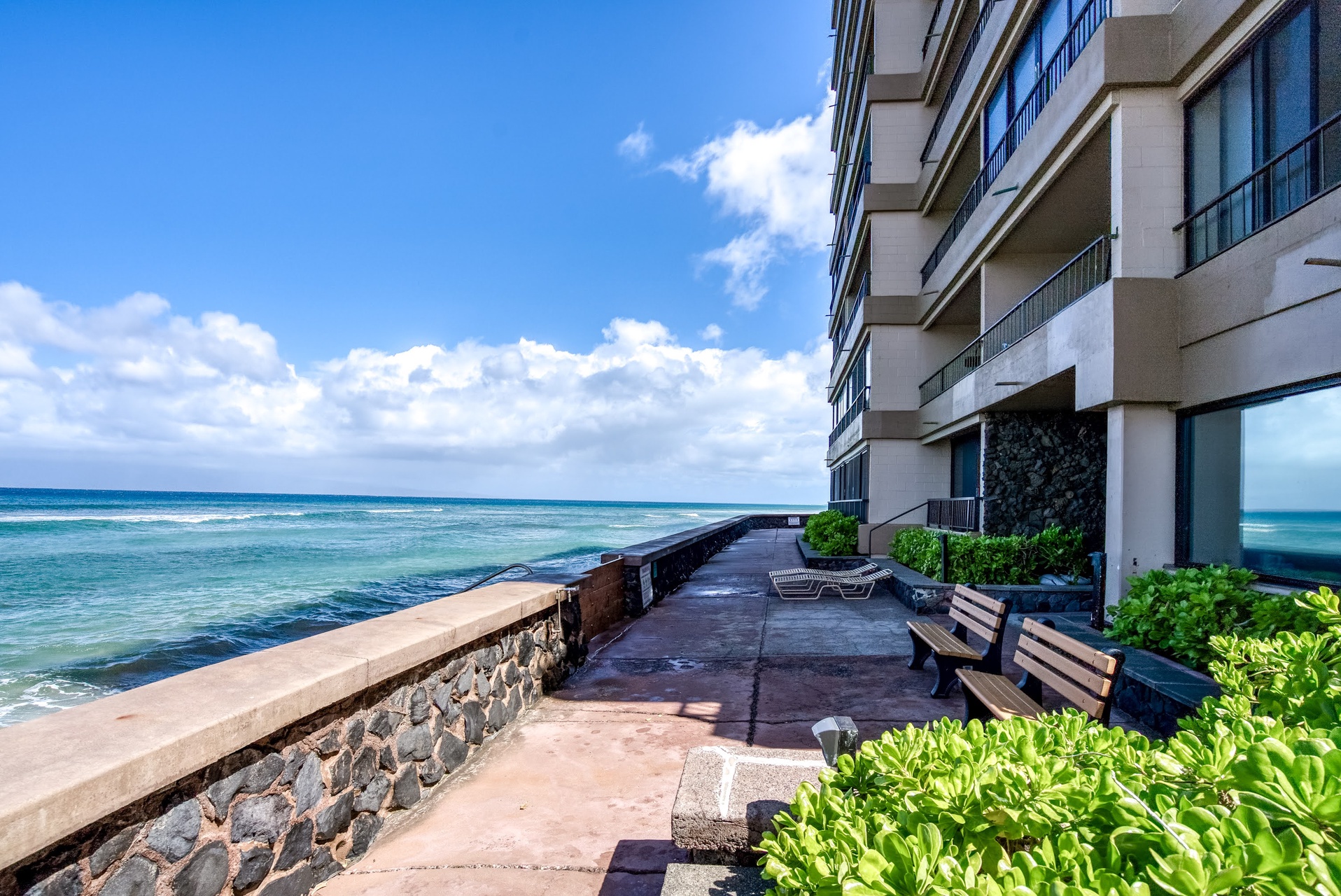 Oceanfront property offering direct access to a serene coastal setting, perfect for enjoying the tropical surroundings and the soothing sound of the waves.