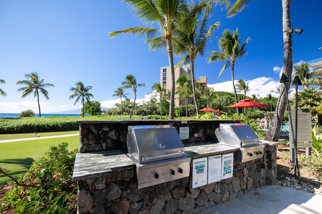 Fire up your favorite meals at the outdoor BBQ grills, perfectly positioned with tropical landscaping and ocean breezes surrounding you. Paradise grilling awaits under swaying palms.