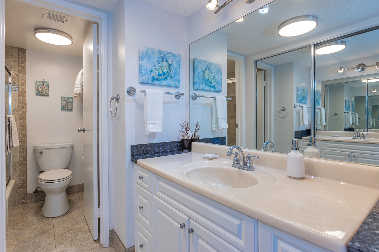 Soft natural tones create a relaxing primary bath retreat