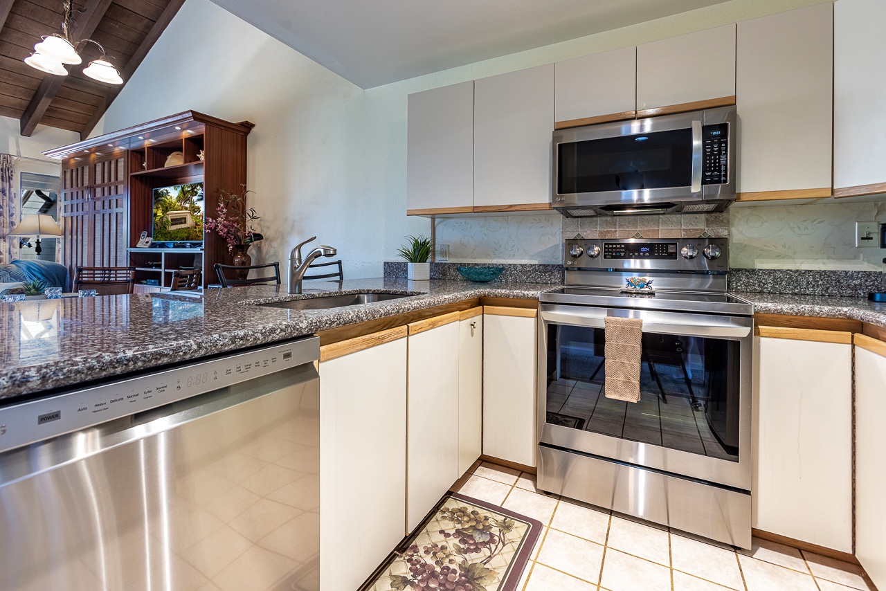 Step into your beautifully appointed kitchen with granite counters, stainless steel appliances, and everything you need to prepare meals in comfort and style.