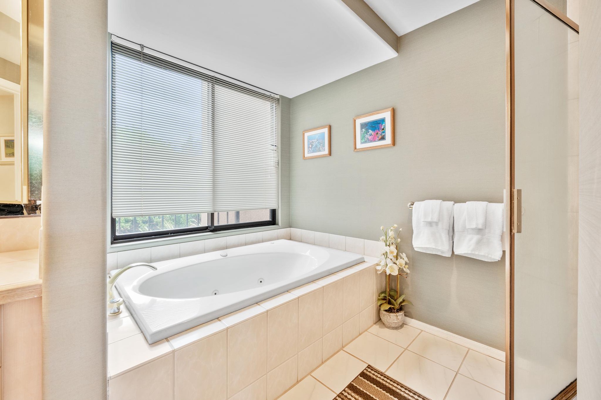 Spacious bath perfect for winding down together or solo