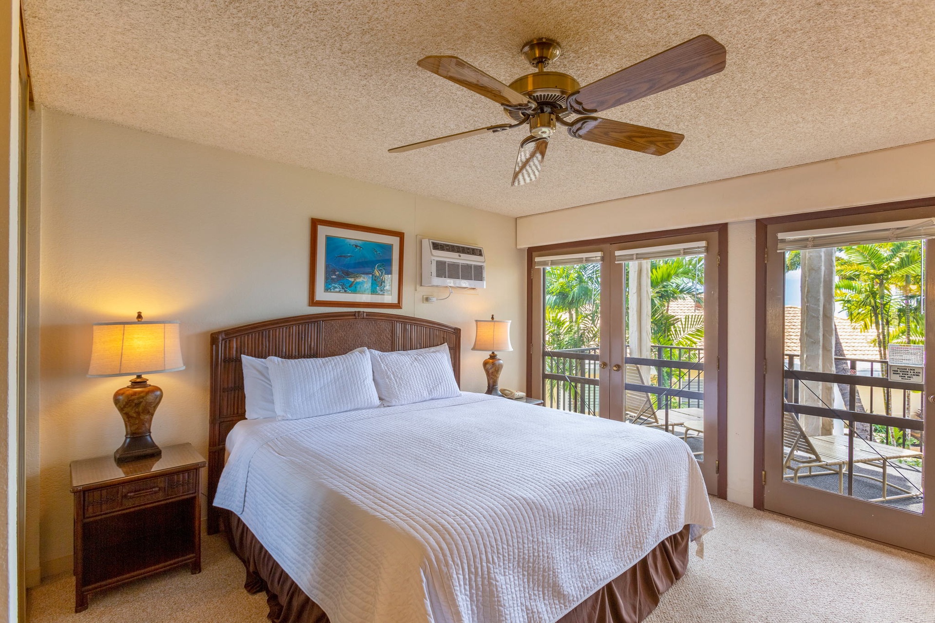 Second bedroom downstairs also offers access to lanai