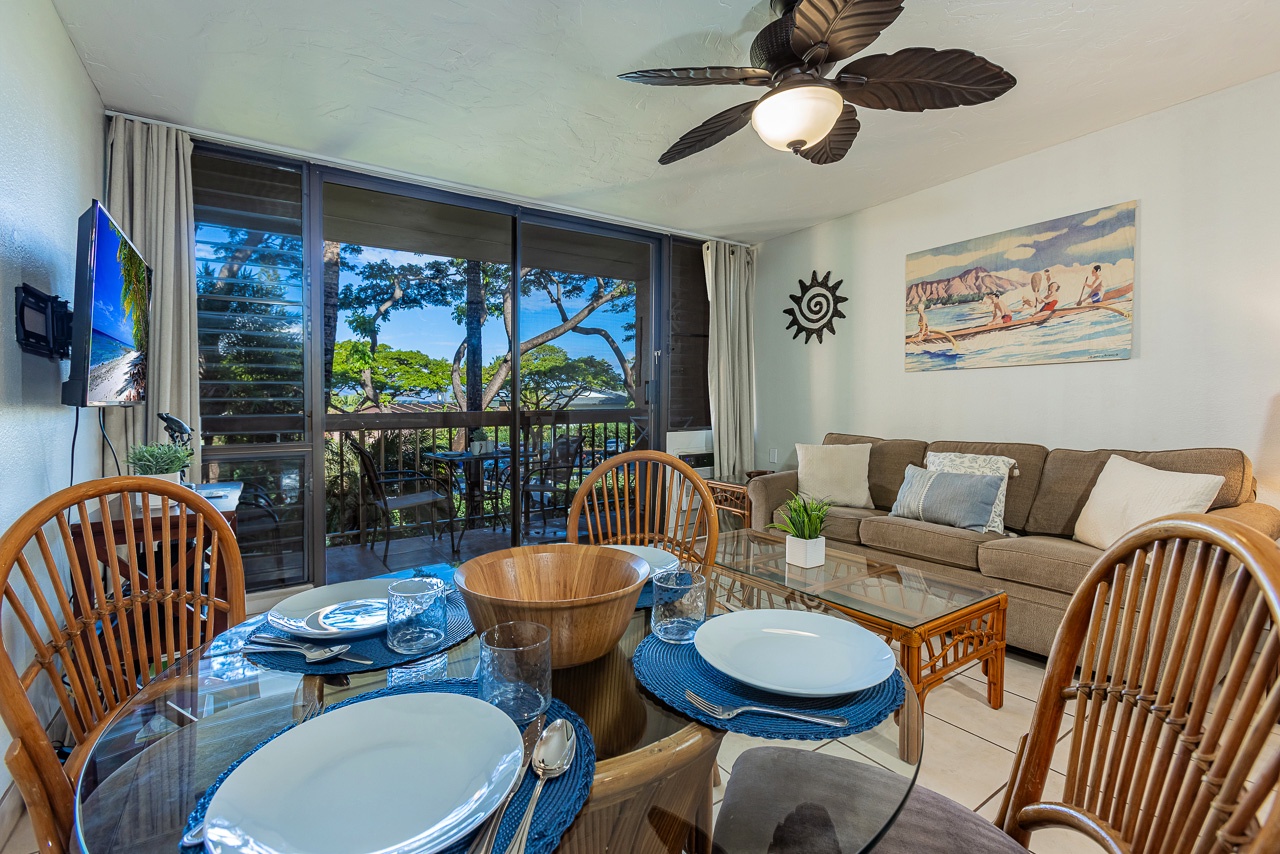 Open living space flowing to the lanai with dining for four