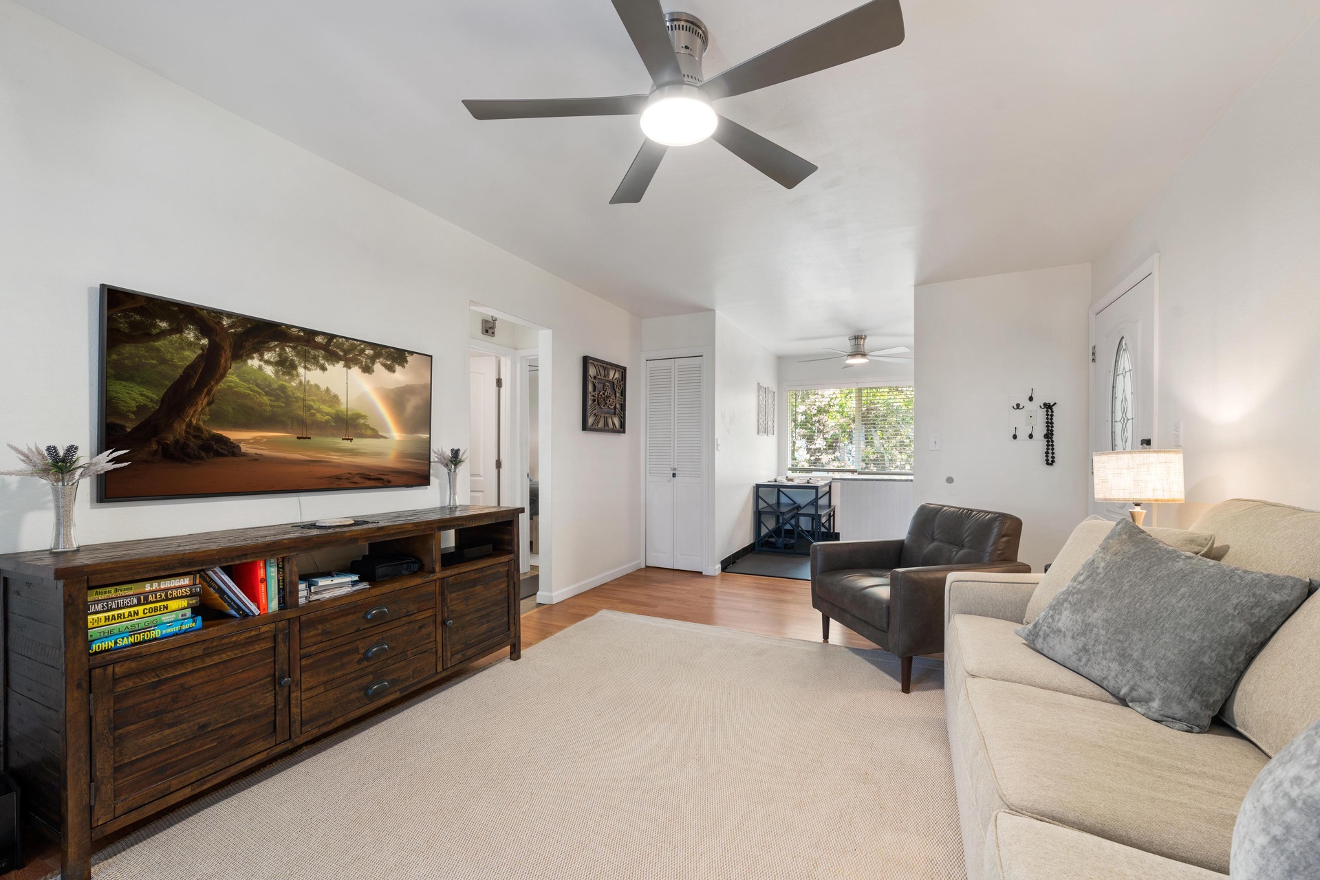 Living area leading to dining and kitchen area