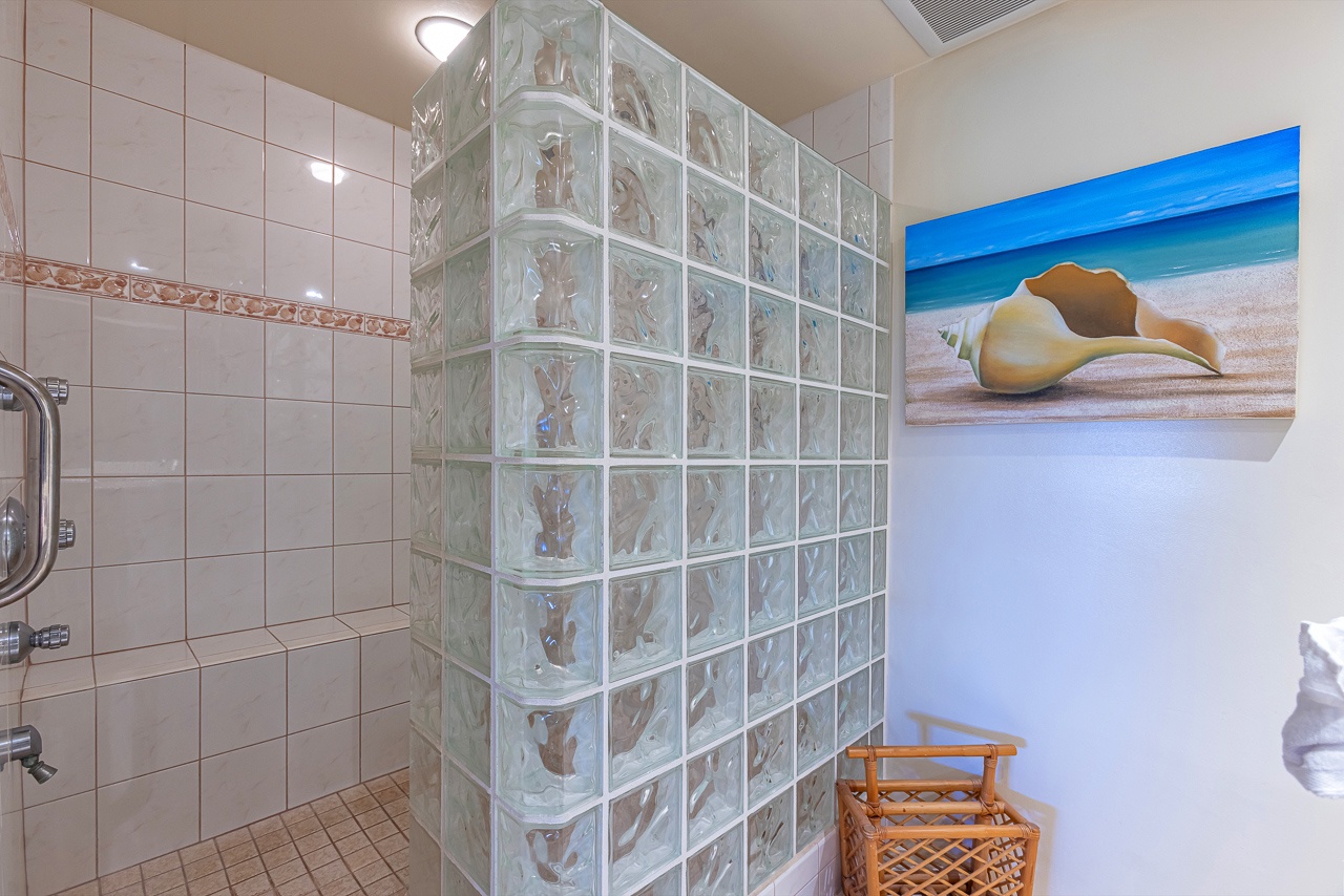 Step into your private spa-like retreat with a beautifully designed glass block shower that fills the space with soft, filtered light.